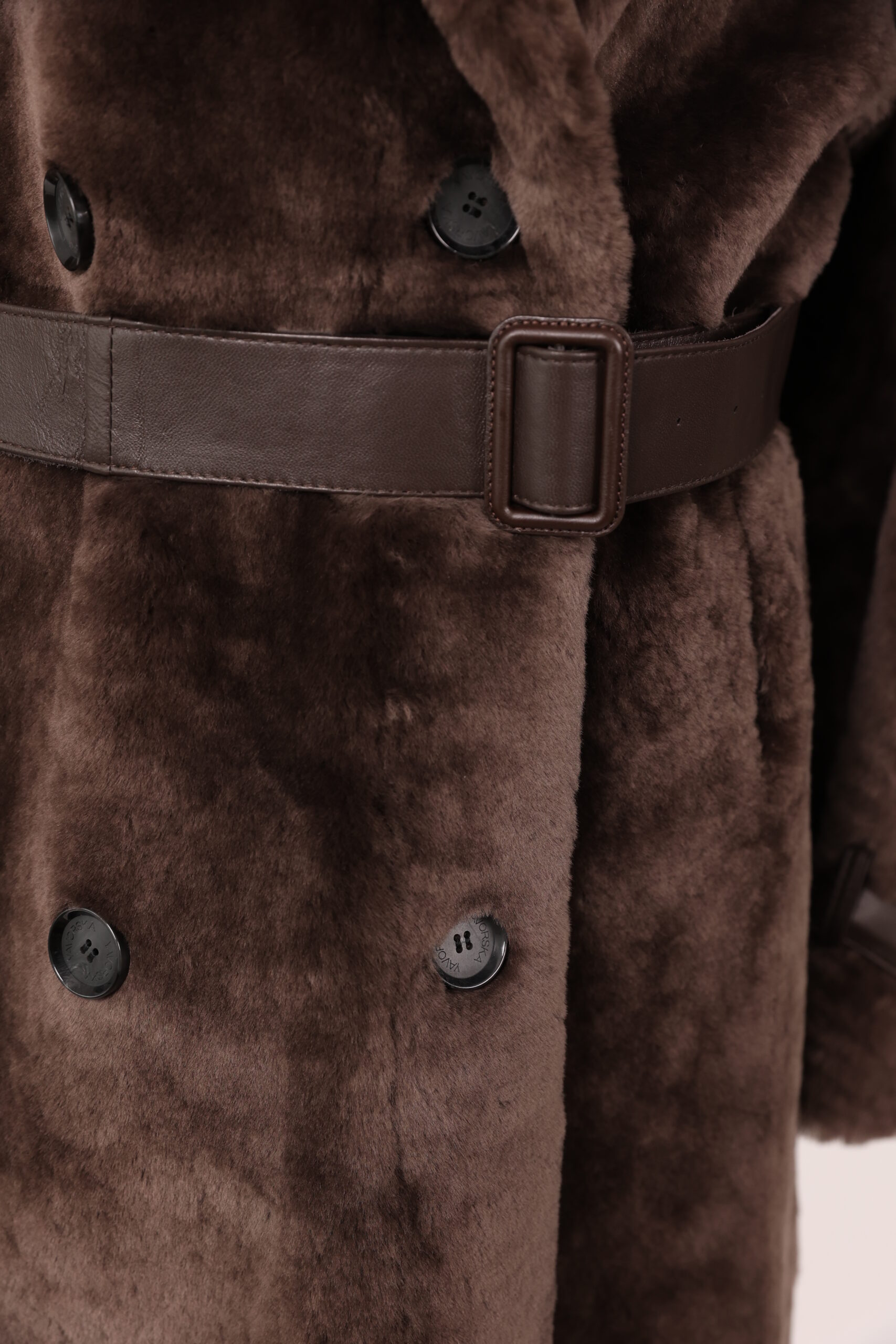 A tailored shearling double-breasted coat